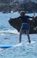 EMMA STONE Surfing in Hawaii