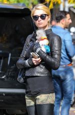 PARIS HILTON with Her Dog Waiting for a Cab in New York