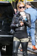 PARIS HILTON with Her Dog Waiting for a Cab in New York