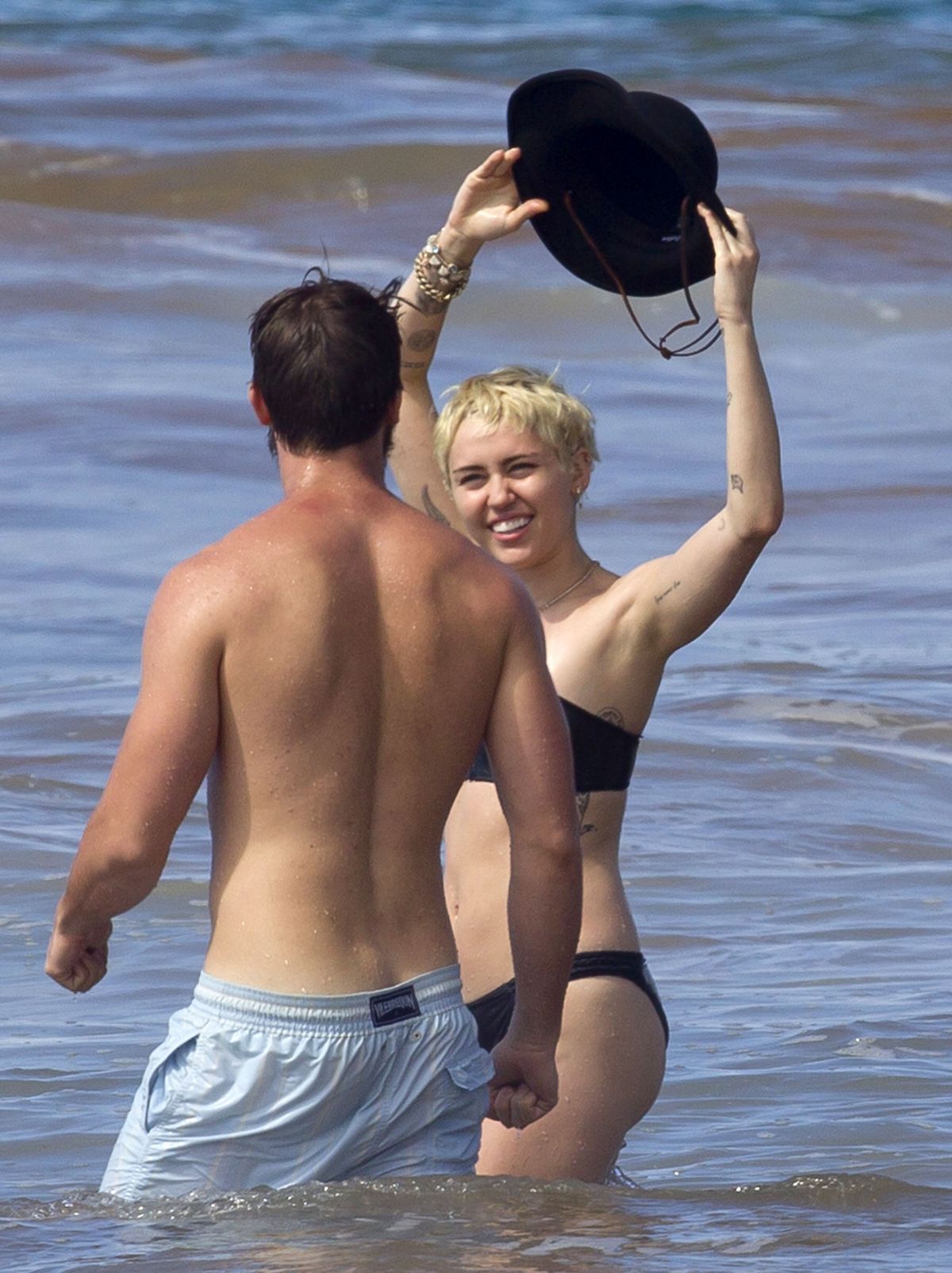Miley Cyrus In Bikini And Patrick Schwarzenegger On The Beach In Hawaii Hawtcelebs