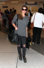 ASHLEY GREENE Arrives at LAX Airport in Los Angeles