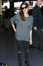 ASHLEY GREENE Arrives at LAX Airport in Los Angeles