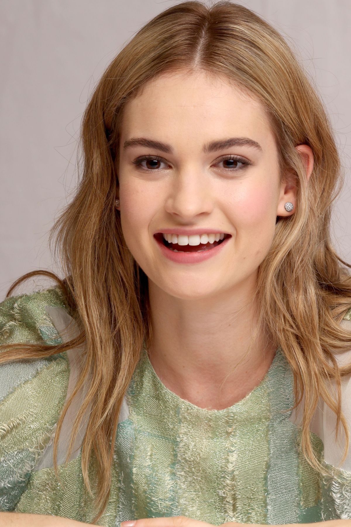 LILY JAMES at Cinderella Press Conference in Beverly Hills – HawtCelebs