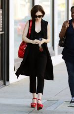LILY COLLINS Leaves Cryohealthcare in Los Angeles 02/21/2016