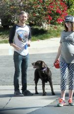 Pregnant ANNE HATHAWAY Walks Her Dog Out in Los Angeles 02/14/2016