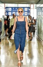 MARGOT ROBBIE Arrives at Airport in Peking 07/07/2016