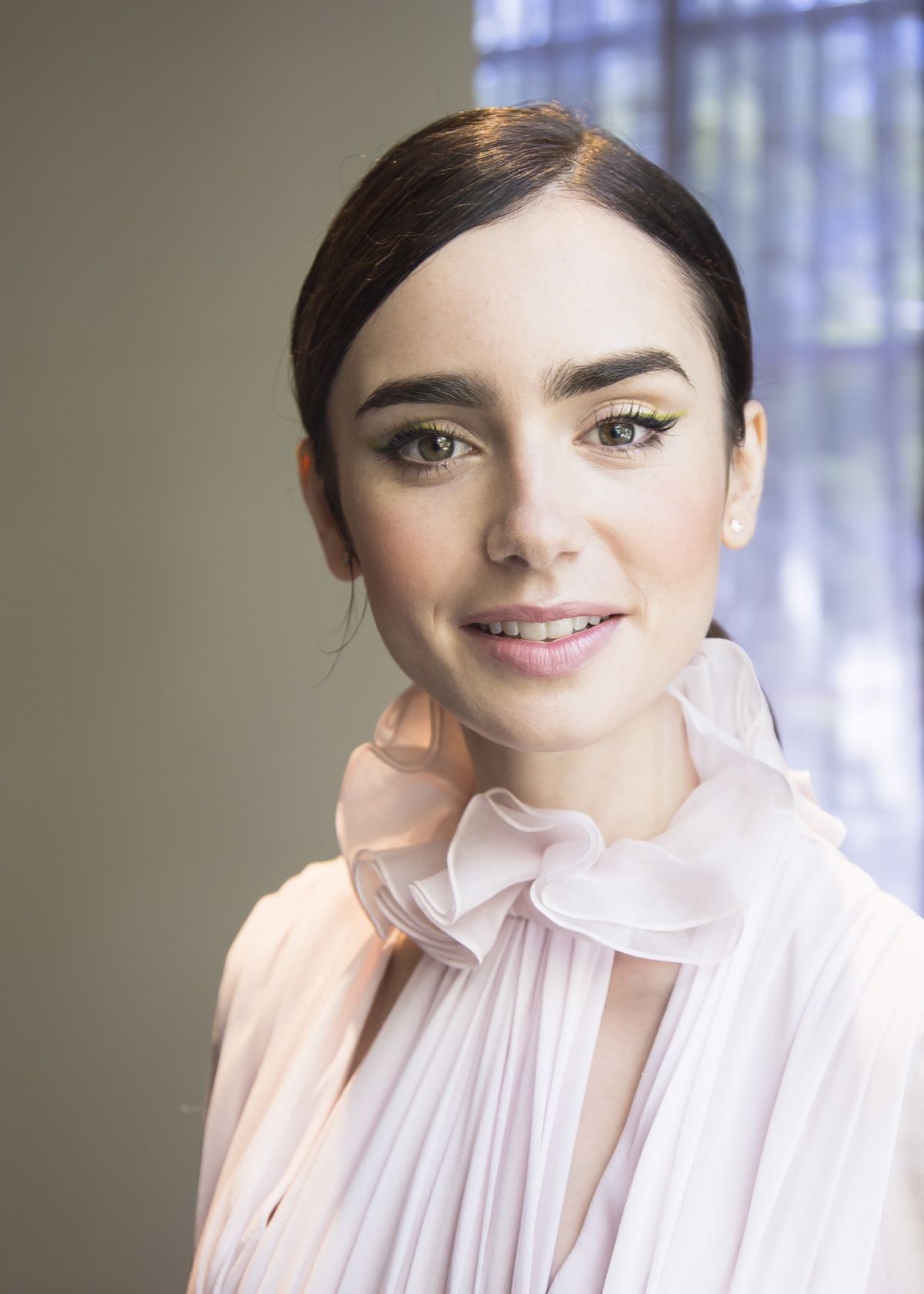 LILY COLLINS at “Rules Don’t Apply’ Press COnference in Beverly Hills ...