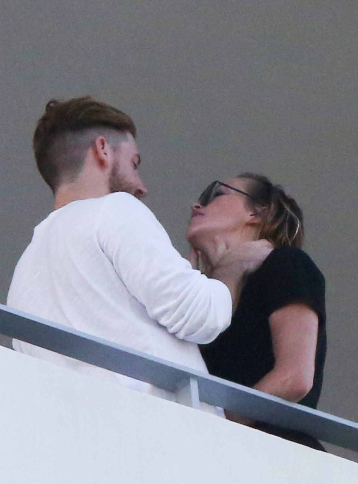 Katie Cassidy Kisses Her Boyfriend On The Balcony Of Her Hotel In Miami 12142016 Hawtcelebs 8660