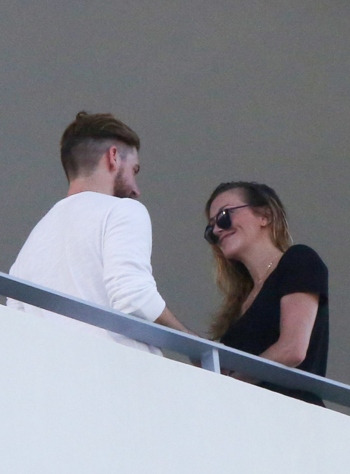 Katie Cassidy Kisses Her Boyfriend On The Balcony Of Her Hotel In Miami 12142016 Hawtcelebs 8257
