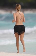 SUKI WATERHOUSE Out Jogging at a Beach in Mexico 01/11/2017