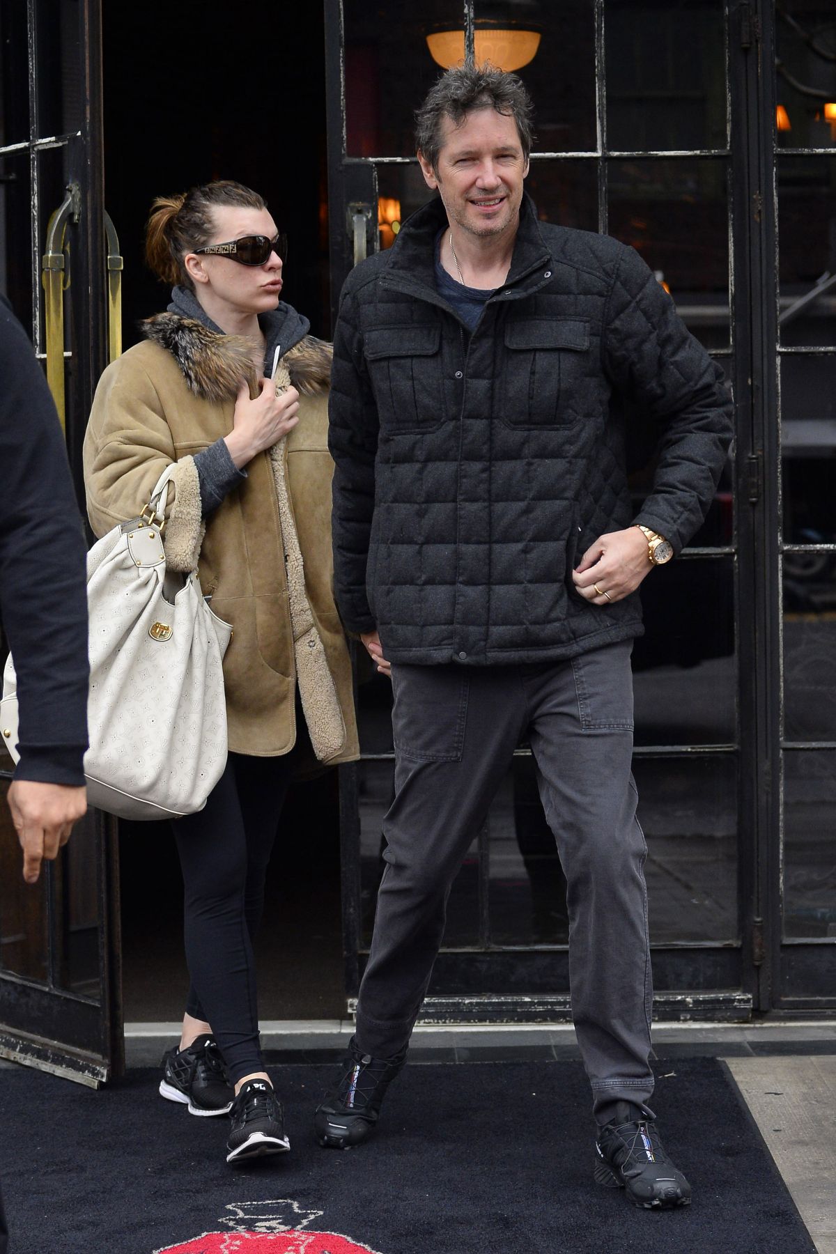 MILLA JOVOVICH and Paul W. S. Anderson Leaves Bowery Hotel in New York ...