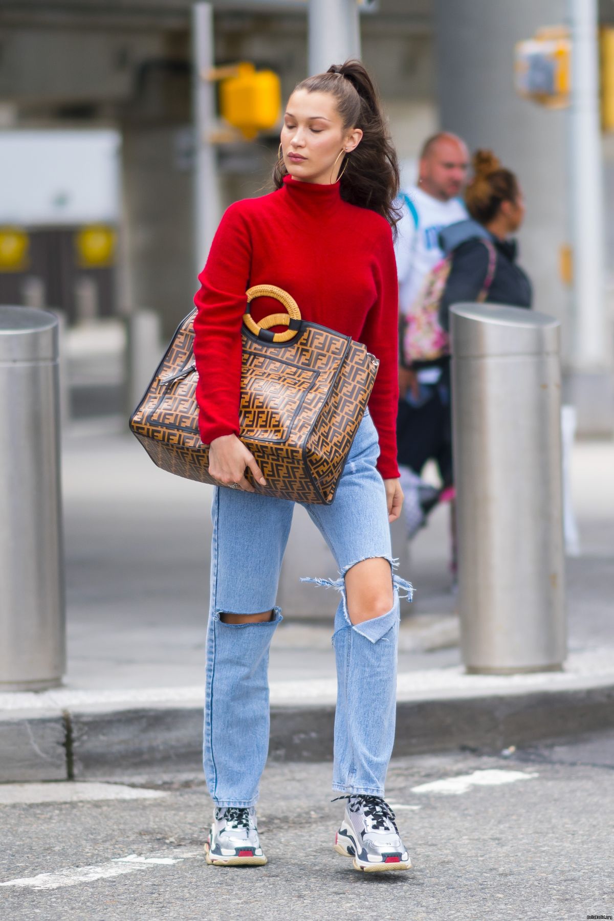 BELLA HADID in Ripped Jeans at JFK Airport in New York 06/02/2018