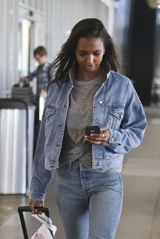 JASMINE TOOKES in Double Denim at LAX Airport in Los Angeles 09/24/2018