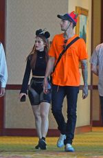 MADELAINE PETSCH and Travis Mills Leaves Disneyland in Anaheim 09/18/2018