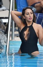SOPHIE KASAEI in Swimsuit at a Pool in Tenerife 09/30/2018