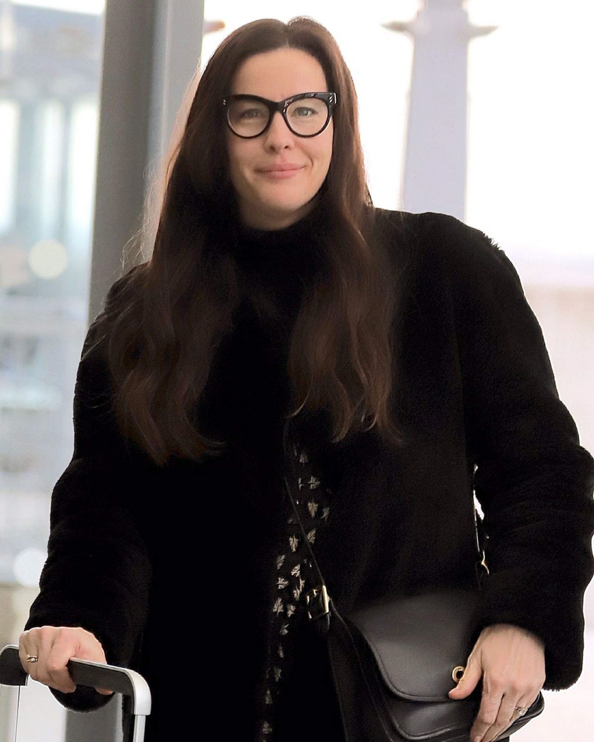 LIV TYLER at Heathrow Airport in London 11/21/2018 HawtCelebs