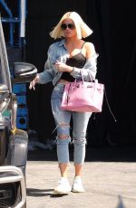 KHLOE KARDASHIAN in Ripped Jeans Out in Los Angeles 03/29/2019