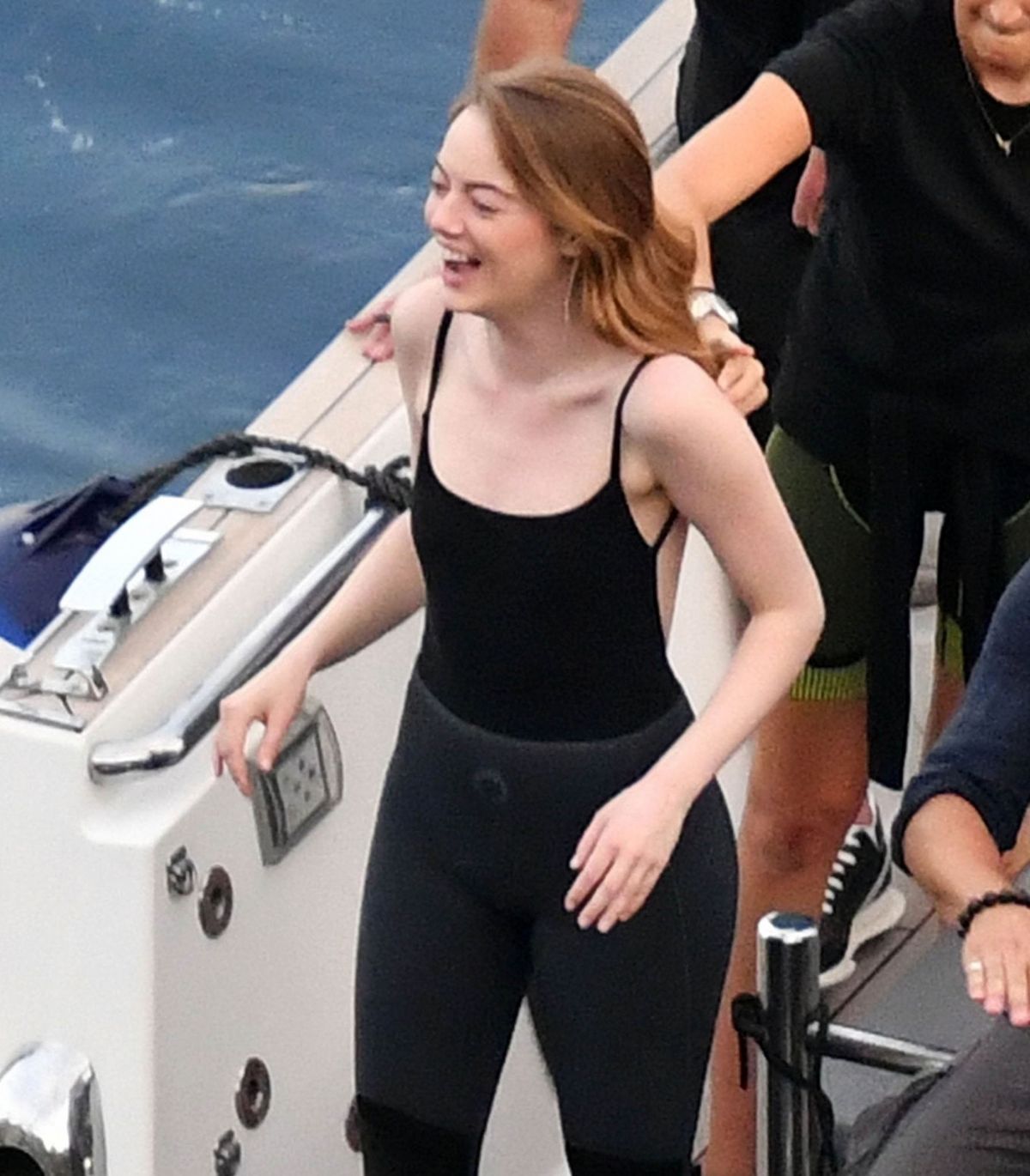 EMMA STONE on the Set of Louis Vuitton Commercial in Capri 09/06/2019 ...