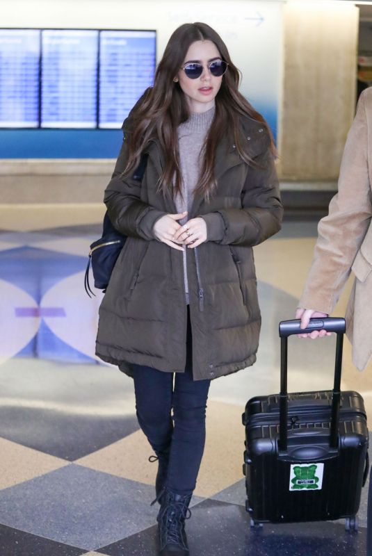 LILY COLLINS at LAX Airport in Los Angeles 11/21/2019 – HawtCelebs