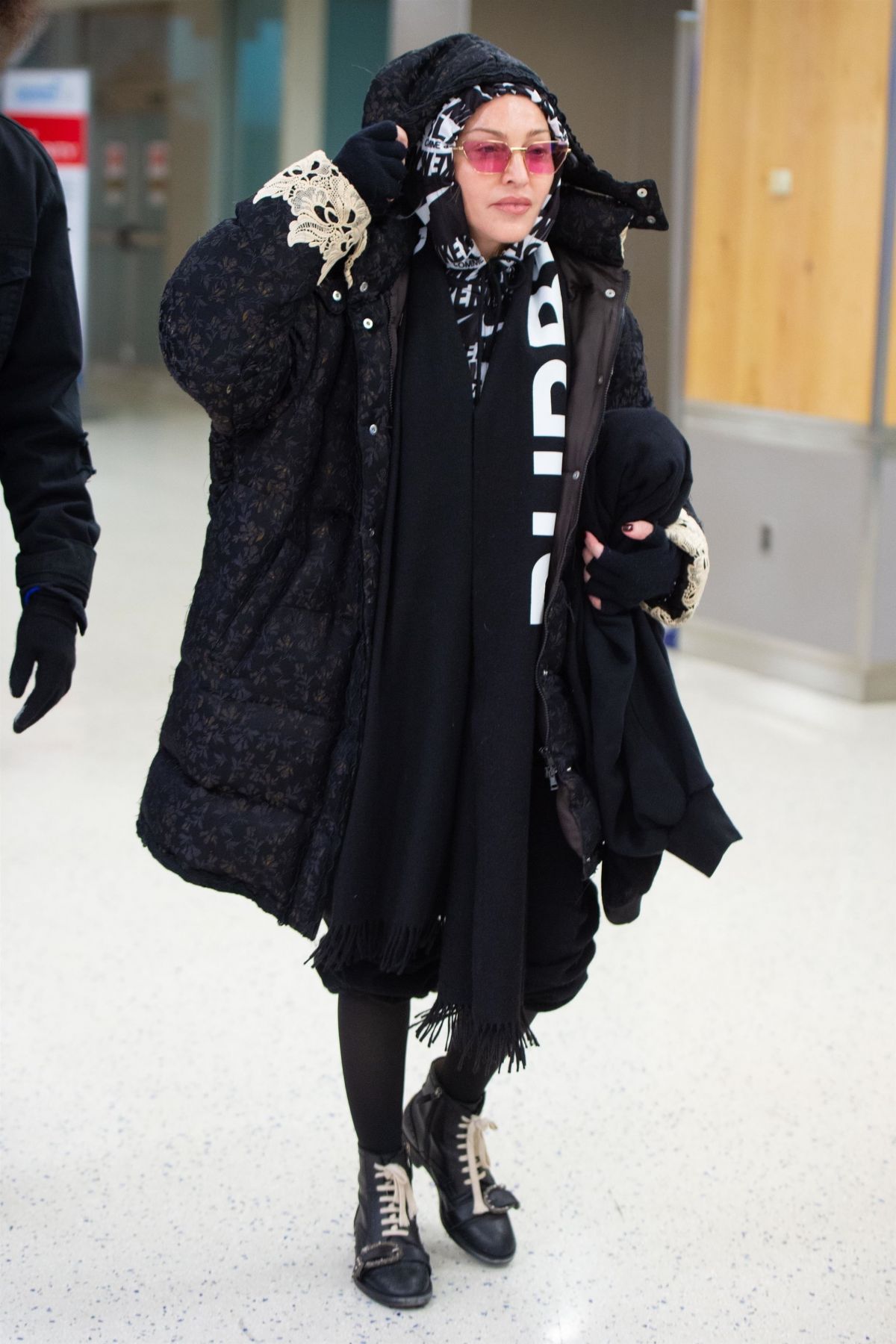 MADONNA Arrives at JFK Airport in New York 12/27/2019 HawtCelebs
