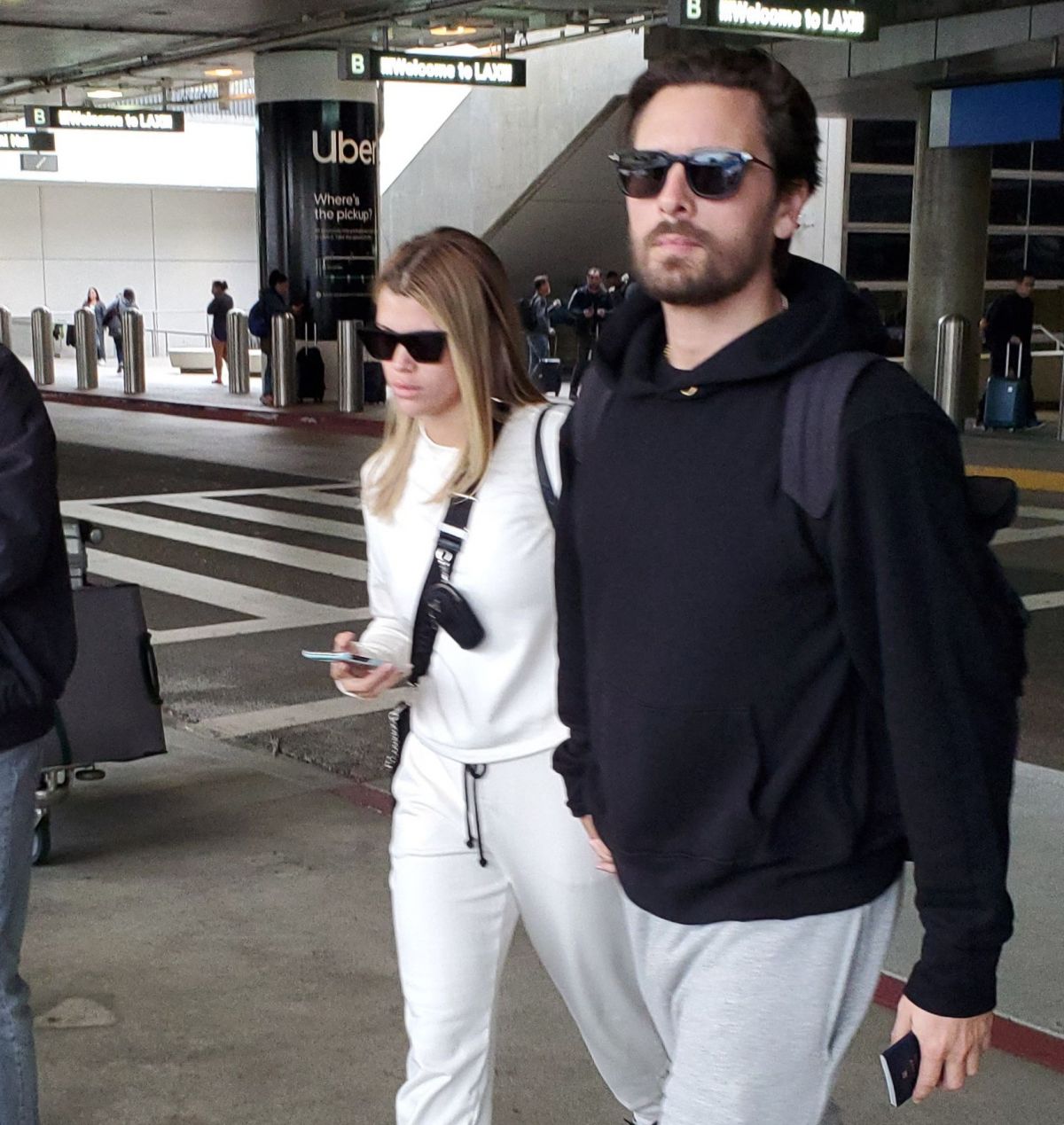 Scott Disick departing on a flight at LAX airport for Kim's