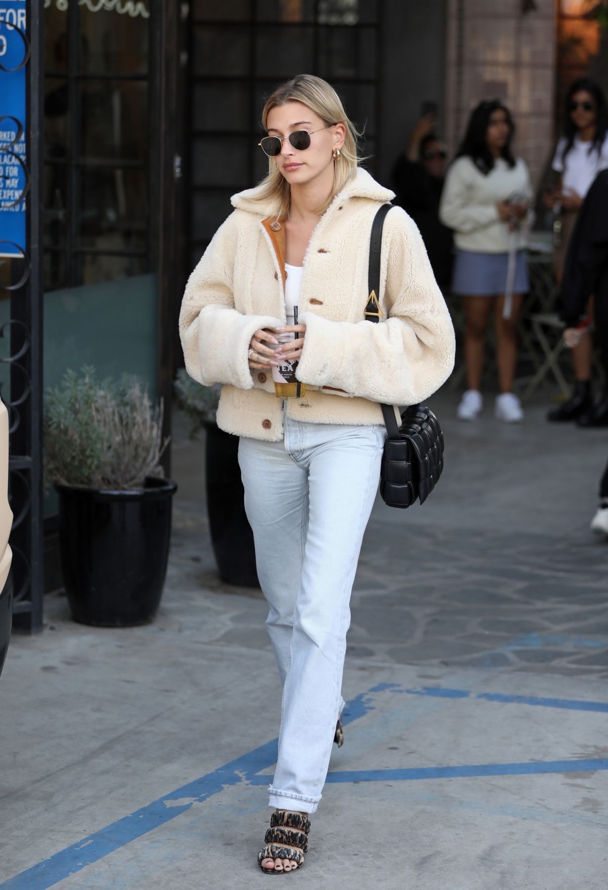 hailey bieber rocks louis vuitton fanny pack as she arrives at nine zero  one hair salon in west hollywood, los angeles-151019_4