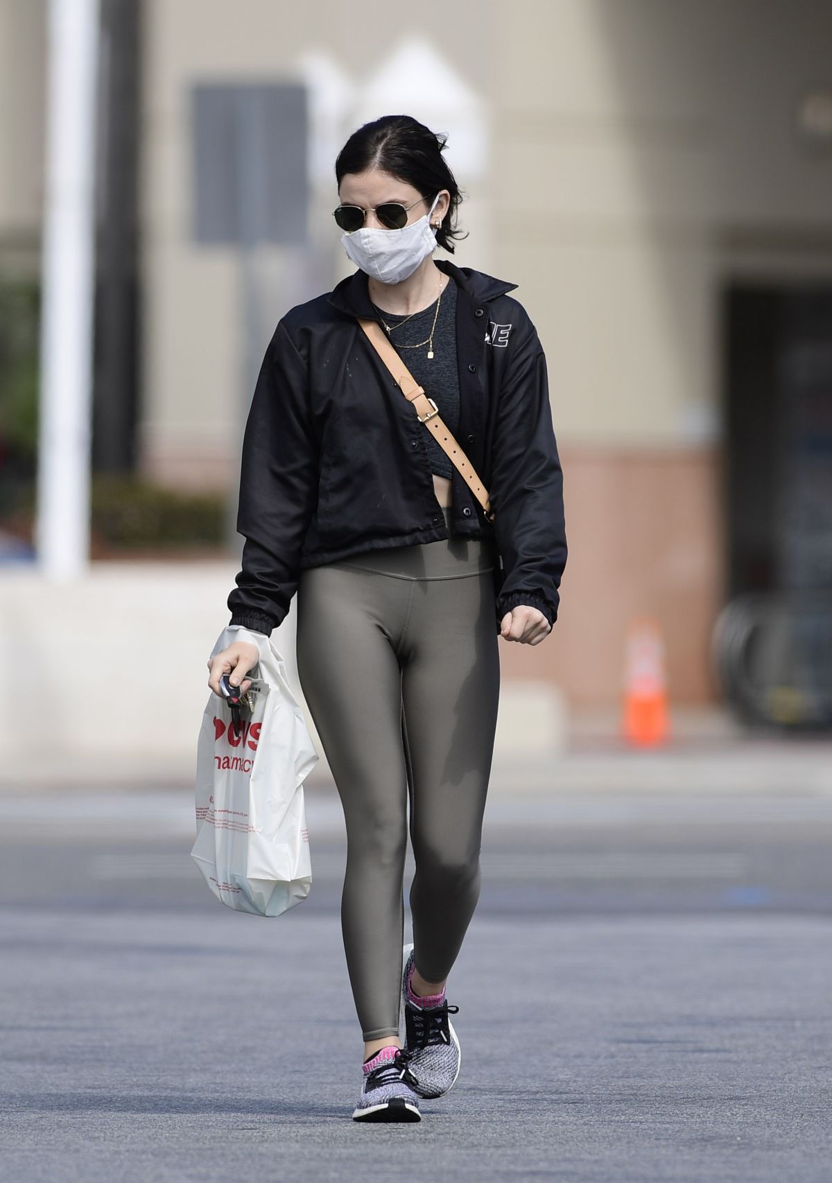 Lucy Hale wears her mask as she stops by a CVS in Los Angeles
