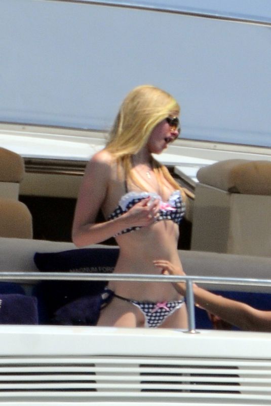 AVRIL LAVIGNE in Bikini at a Boat 06/23/2011