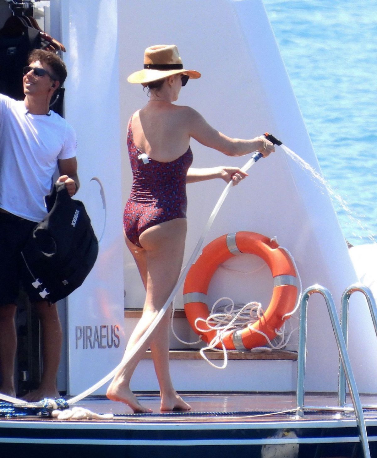 Charlize Theron In Swimsuit At A Yacht At Poros Island 08082021 Hawtcelebs 