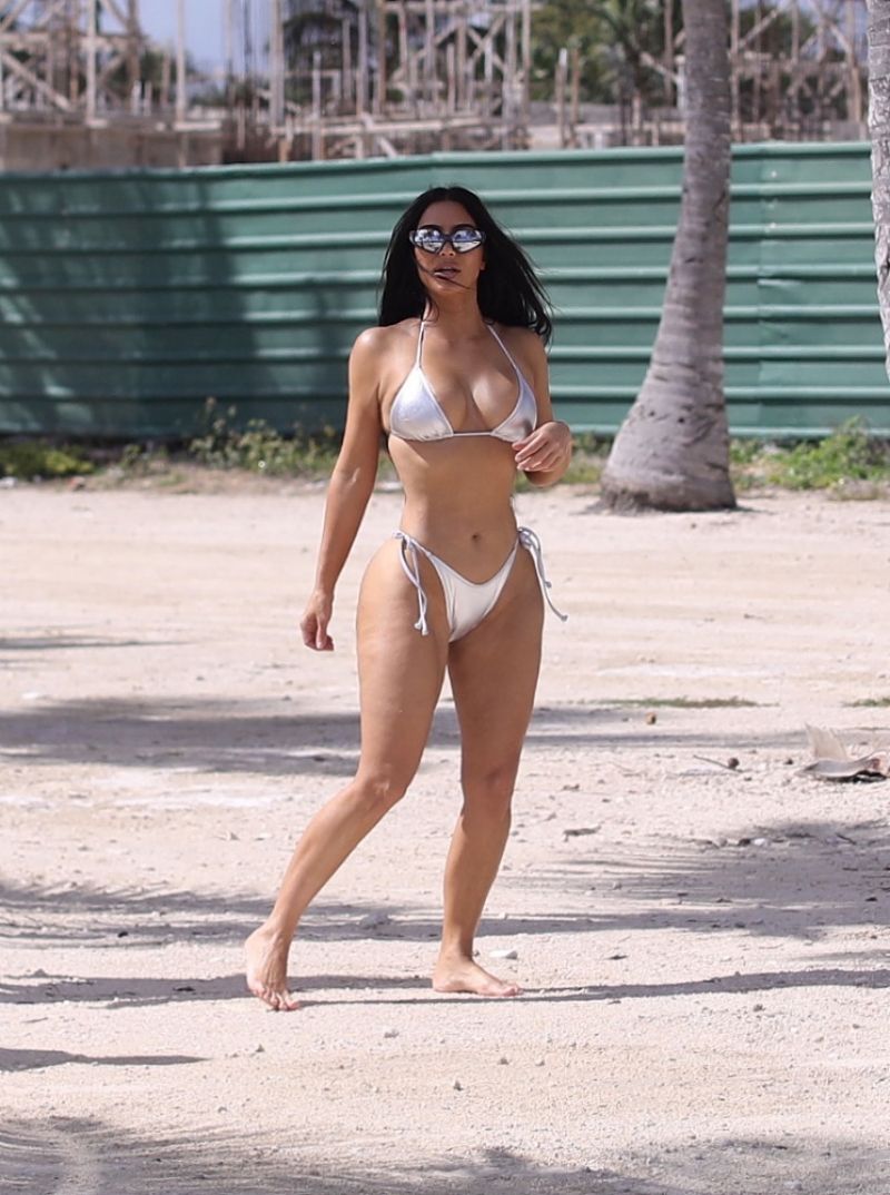 Kim Kardashian Puts On A Sizzling Display As She Shows Off Her Taut Tummy And Famous Derriere In