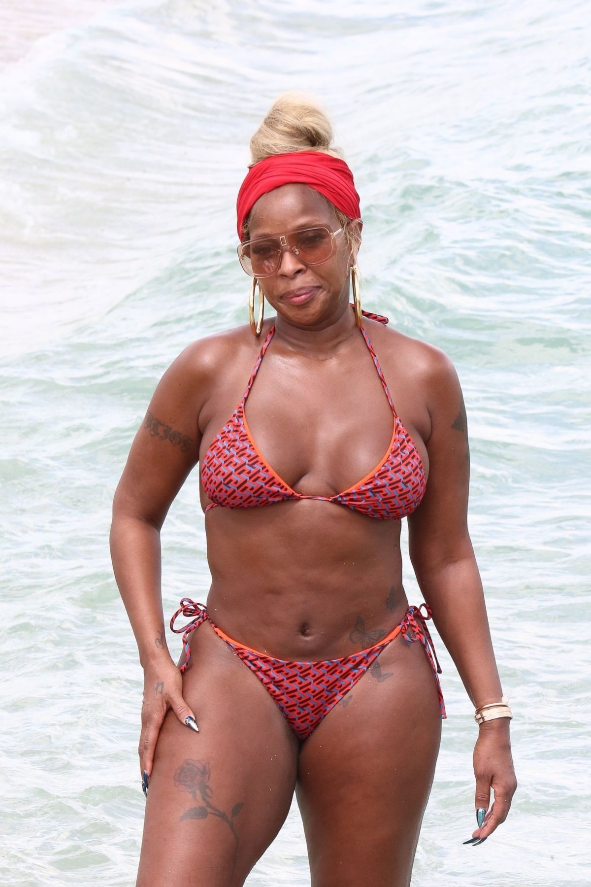 MARY J. BLIGE in Bikini at a Beach in Miami 03/12/2022.