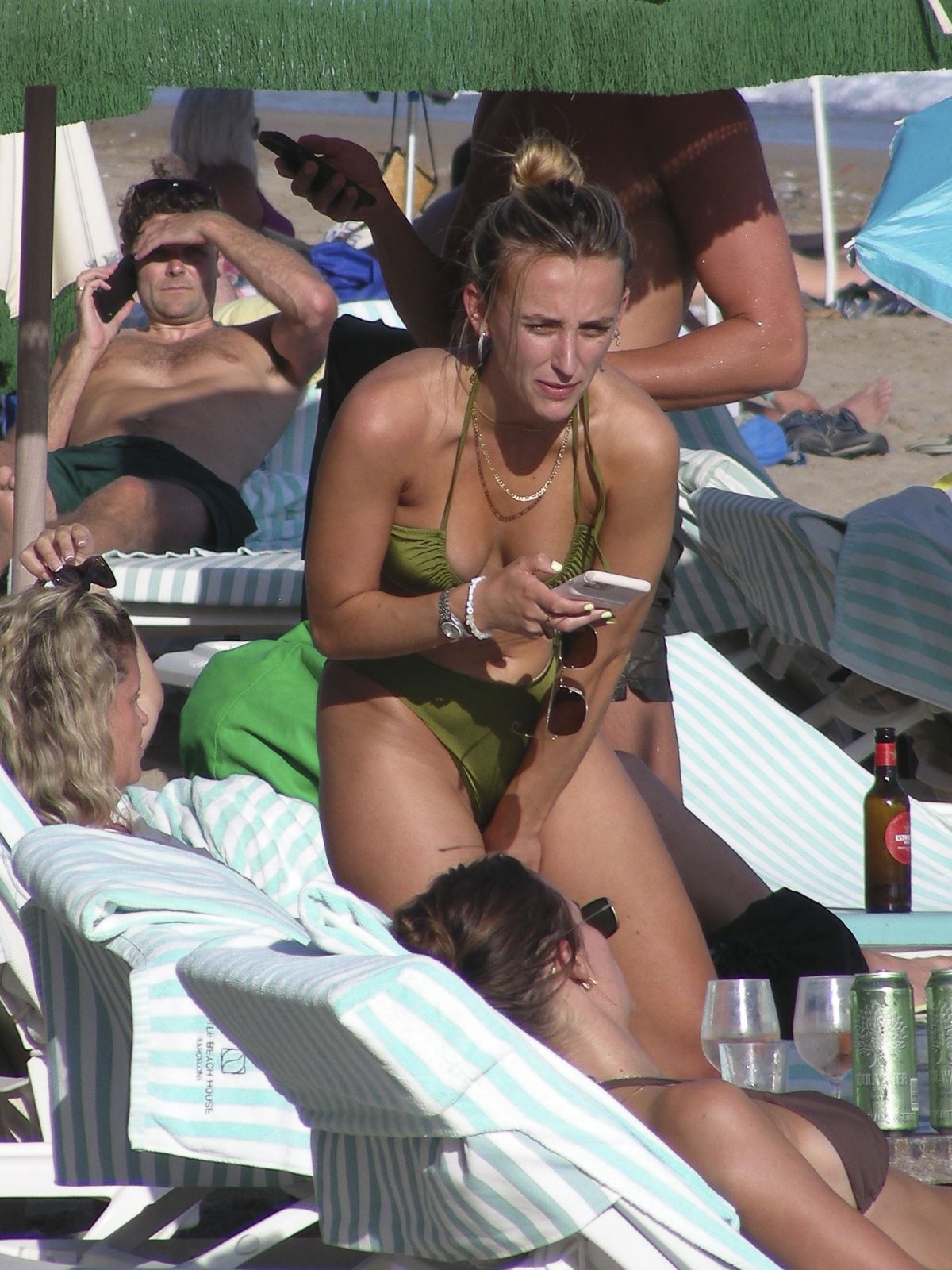 TIFFANY and LUCY WATSON in Bikinis on the Beach in Barcelona 09/01/2022.
