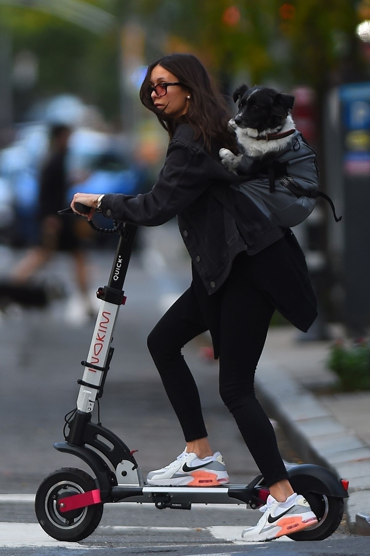 Nina Dobrev and Shaun White look happy as they take a scooter ride