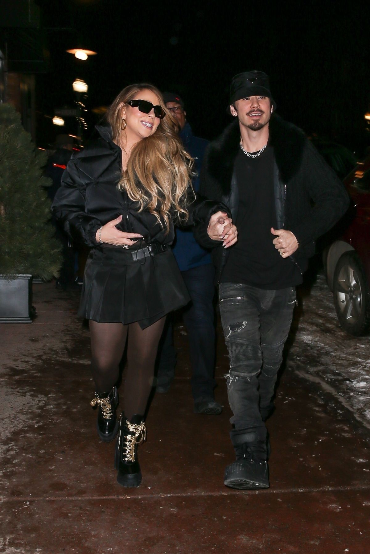 Mariah Carey wears visor shades and drinks champagne on trip to Louis  Vuitton store in Aspen