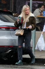 HILARY DUFF Gets Lunch to-go in Beverly Hills 01/04/2023