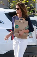 CINDY CRAWFORD Shopping at Whole Foods After Leaving a Spa in Malibu 05/09/2023