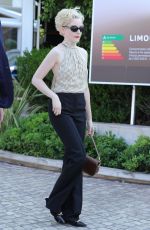JULIA GARNER Out and About in Cannes 05/23/2023