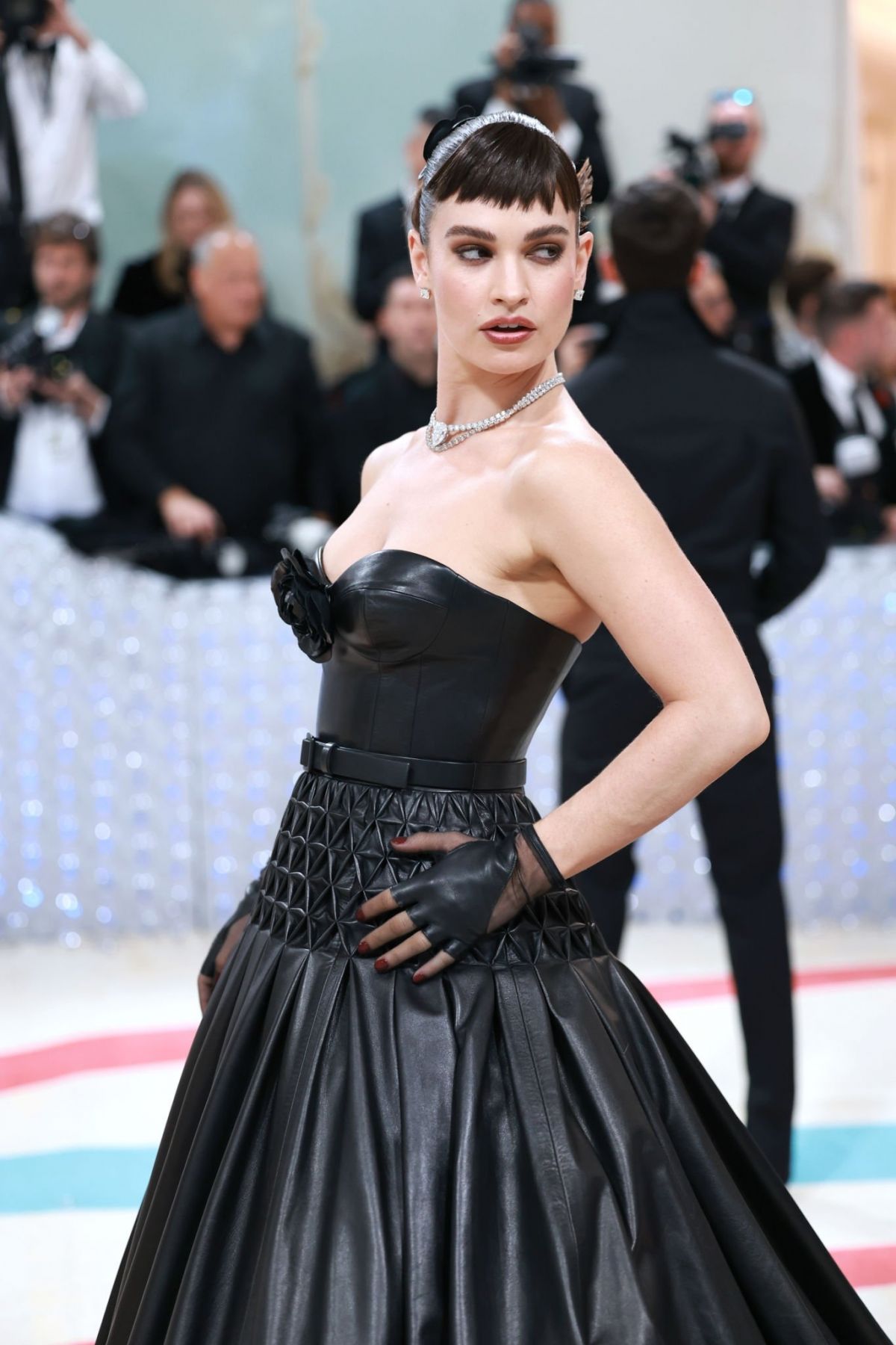 LILY JAMES at 2023 Met Gala Celebrating Karl Lagerfeld A Line of