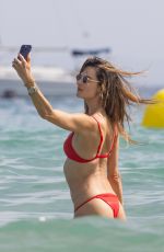 ALESSANDRA AMBROSIO in a Red Bikini at a Beach in Ibiza 07/24/2023