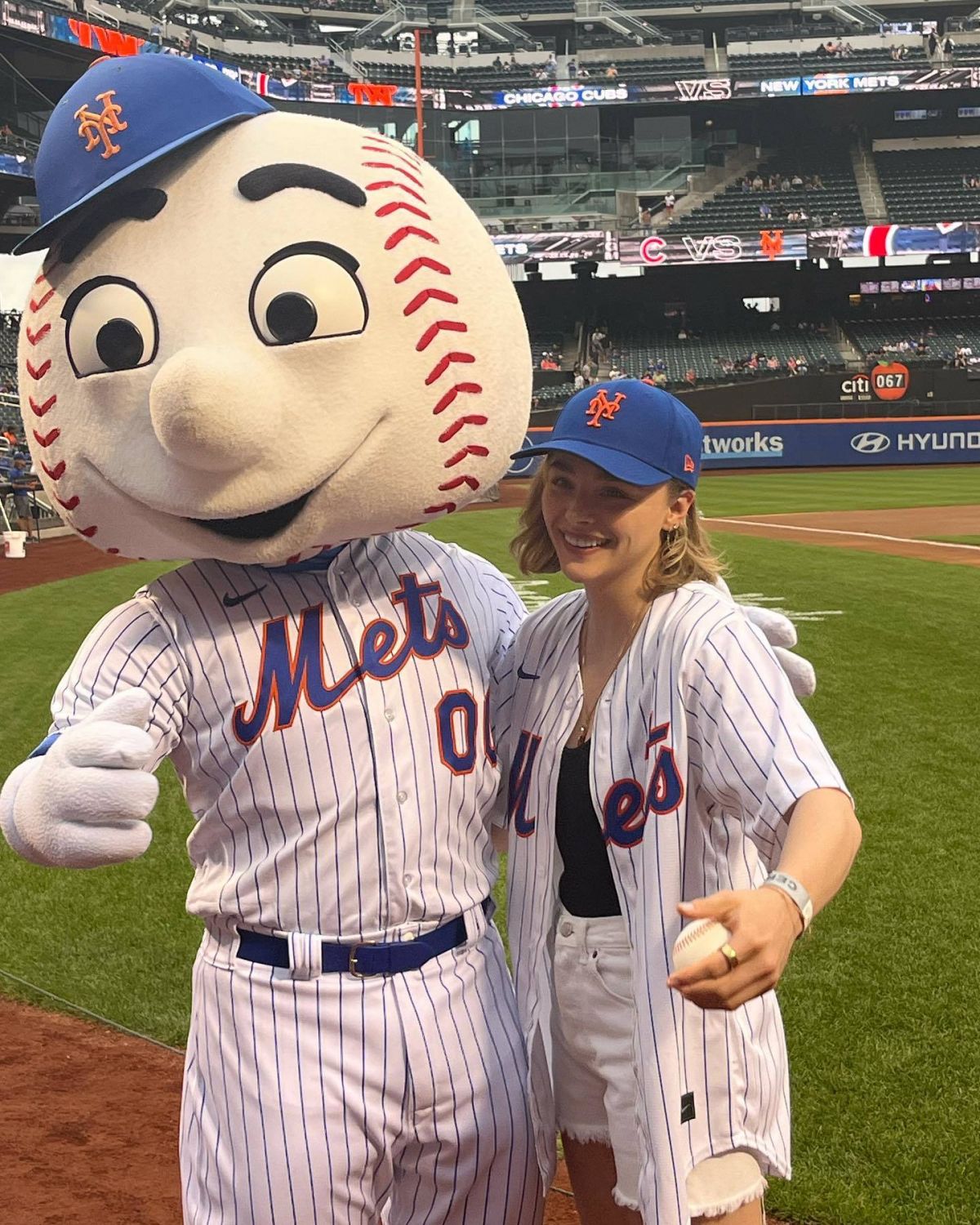 CHLOE MORETZ Throws Out First Pitch at Chicago Cubs vs. New York Mets