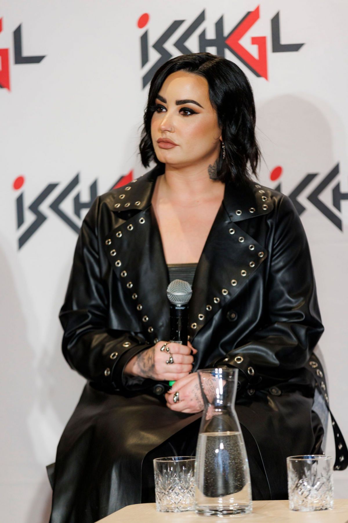 Demi Lovato Gets Cozy in Boots for 'Top of the Mountain' Concert