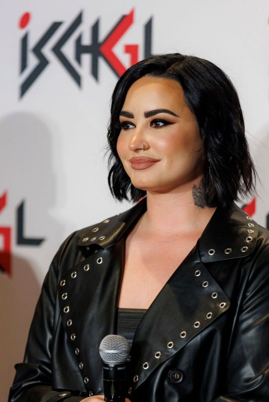 Demi Lovato Gets Cozy in Boots for 'Top of the Mountain' Concert