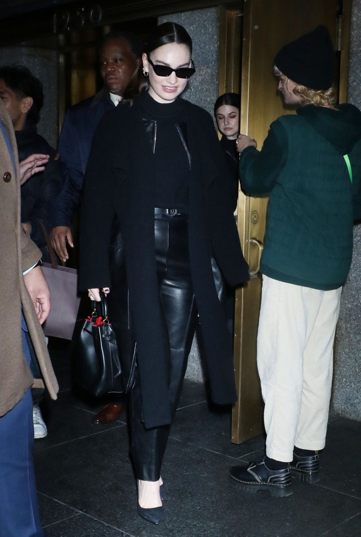 LILY JAMES Arrives at Kelly Clarkson Show in New York 12/18/2023 ...