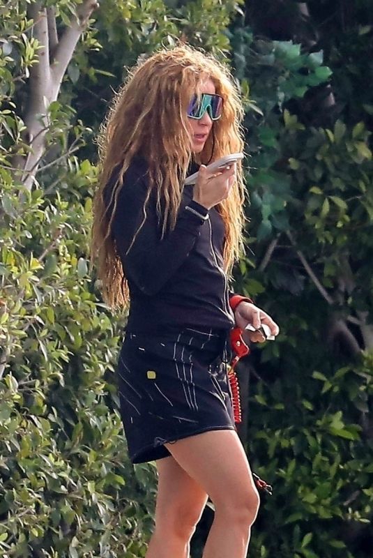 SHAKIRA Out to Make a Phone Call in Miami Beach 12/02/2023