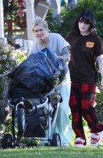ERIKA ELENIAK and Her Daughter Out for a Dog Walk in Los Angeles 01/10/2024