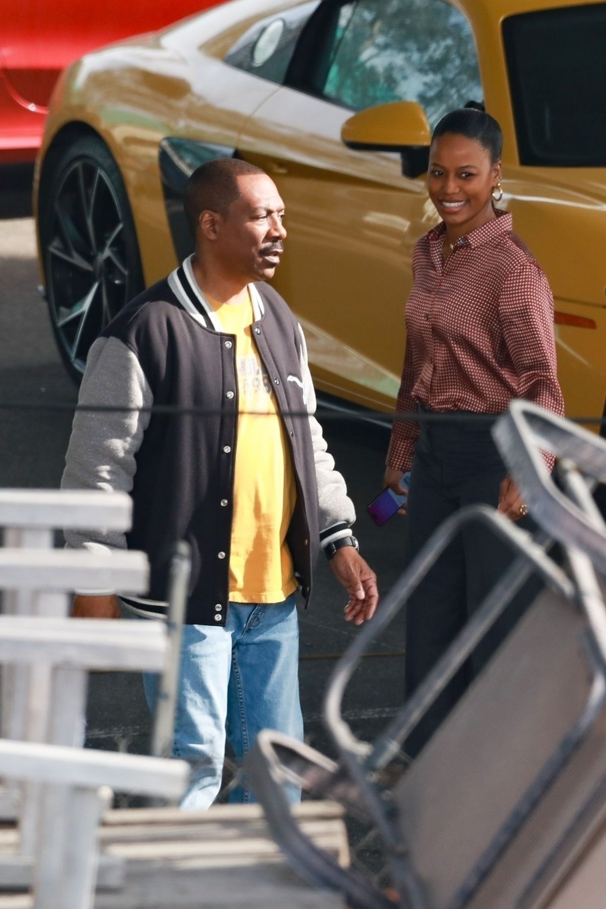 TAYLOUR PAIGE and Eddie Murphy on the Set of Beverly Hills Cop 4 in Los