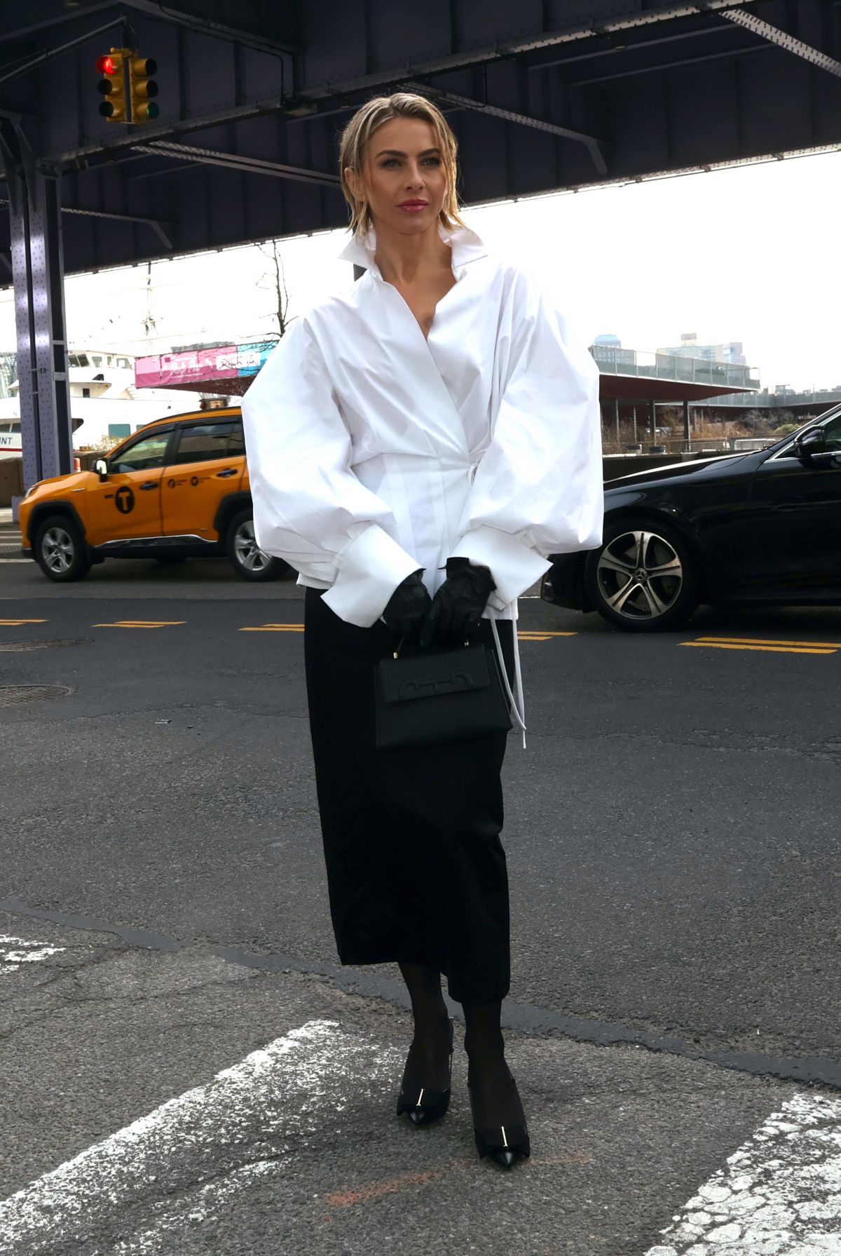 JULIANNE HOUGH Arrives at Carolina Herrera Show at New York Fashion