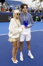 MORGAN RIDDLE Poses with Taylor Fritz After He Wins 2024 Delray Beach Open 02/19/2024