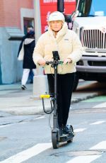 DEBORRA-LEE FUENTES Riding an Electric Scooter Out in New York 03/25/2024