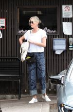 CHARLIZE THERON Out for Sushi with Friends in Los Angeles 04/26/2024